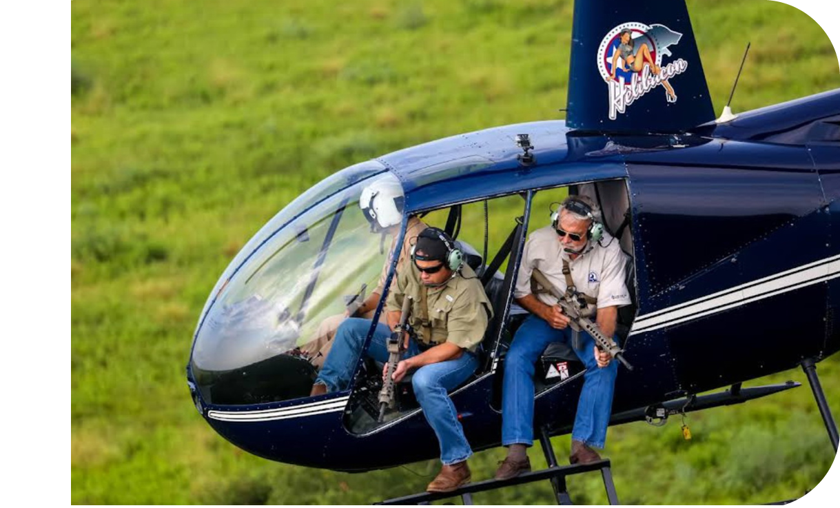 Two men are sitting in a helicopter, each holding a gun. AI generated content