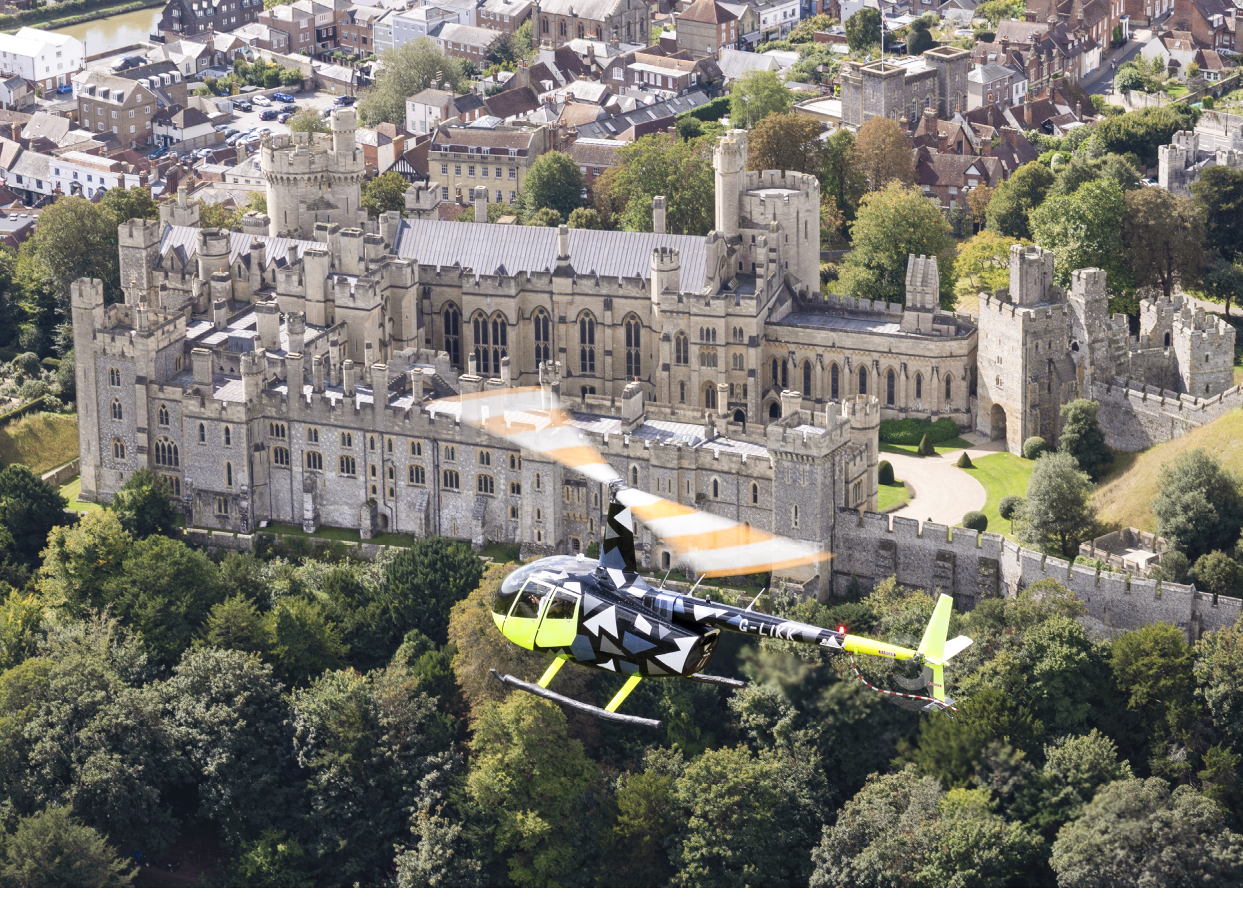 A helicopter is flying over a large castle with a person inside. AI generated content