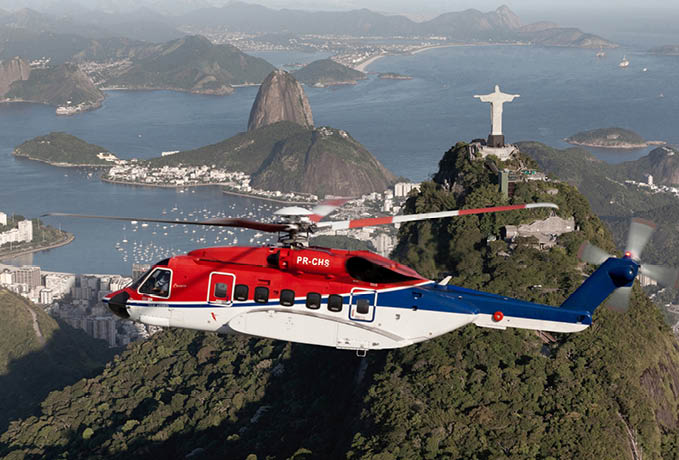 A red and white helicopter is flying over a mountain range with a large cross in the background. AI generated content