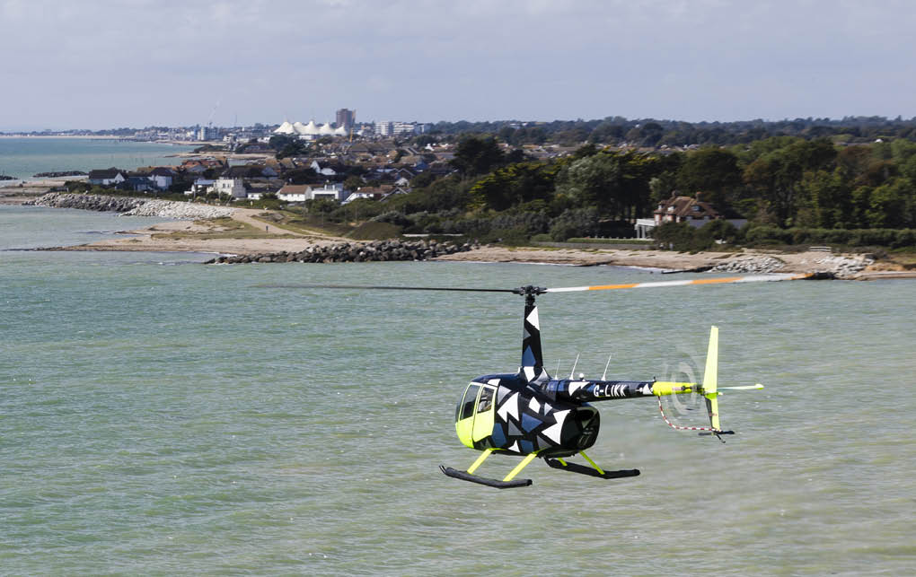 A person is parasailing over a body of water. AI generated content
