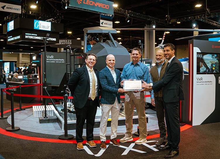 Four men are standing in front of a display, with one of them holding an award. They are posing for a picture. AI generated content