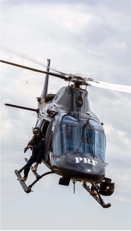 A helicopter with the letters PFR on the side. Description generated by AI