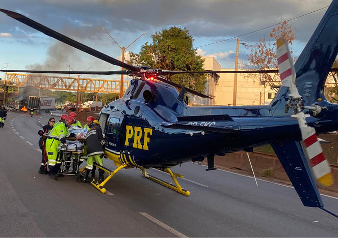 A blue helicopter with the letters PRF on it. Description generated by AI