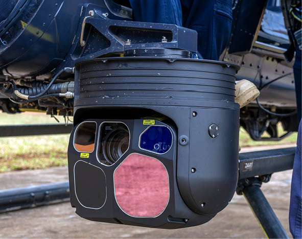 A black camera with a red lens. Description generated by AI
