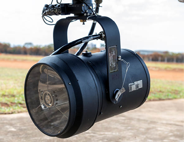 A black light with a white lens. Description generated by AI