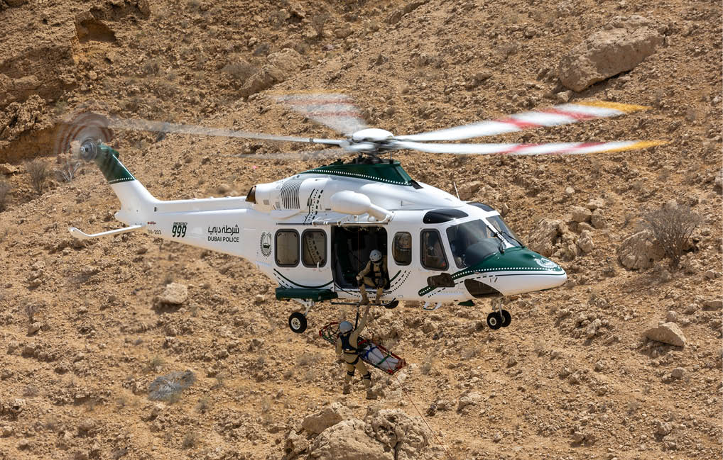 A helicopter is flying over a city. Description generated by AI