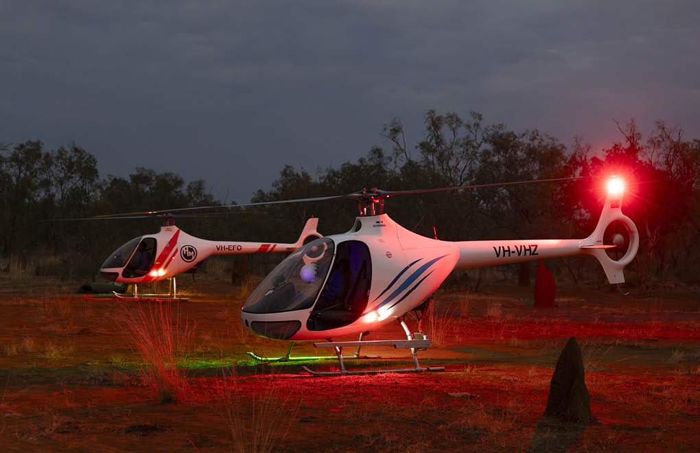 A helicopter with the letters PRF on the side. Description generated by AI