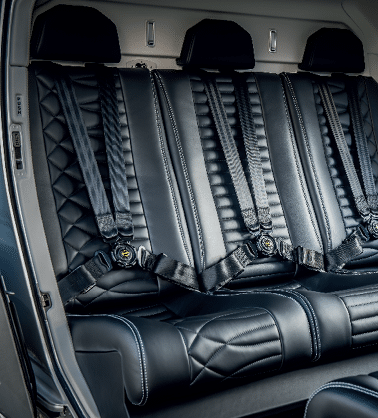 A black leather seat with straps and buckles. AI generated content
