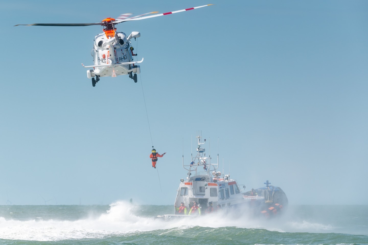 Winching exercise at the North Sea with a Leonardo AW189 SAR helicopter of the Netherlands Coastguard. The Netherlands Coastguard is a civil
organisation that carries out tasks on the Netherlands North Sea for six Ministries under administration of the Royal Netherlands Navy.