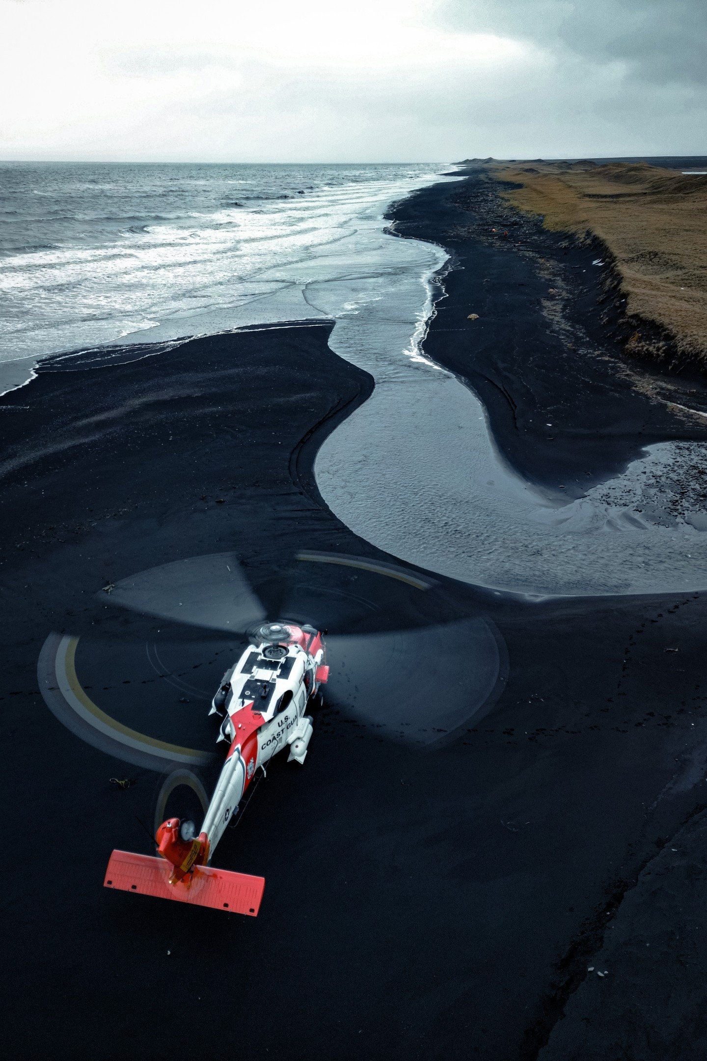 A United Stated Coast Guard Air Station Kodiak MH-60T Jayhawk helicopter conducts off airport landing training near Cold Bay, Alaska in the
Aleutian Islands.