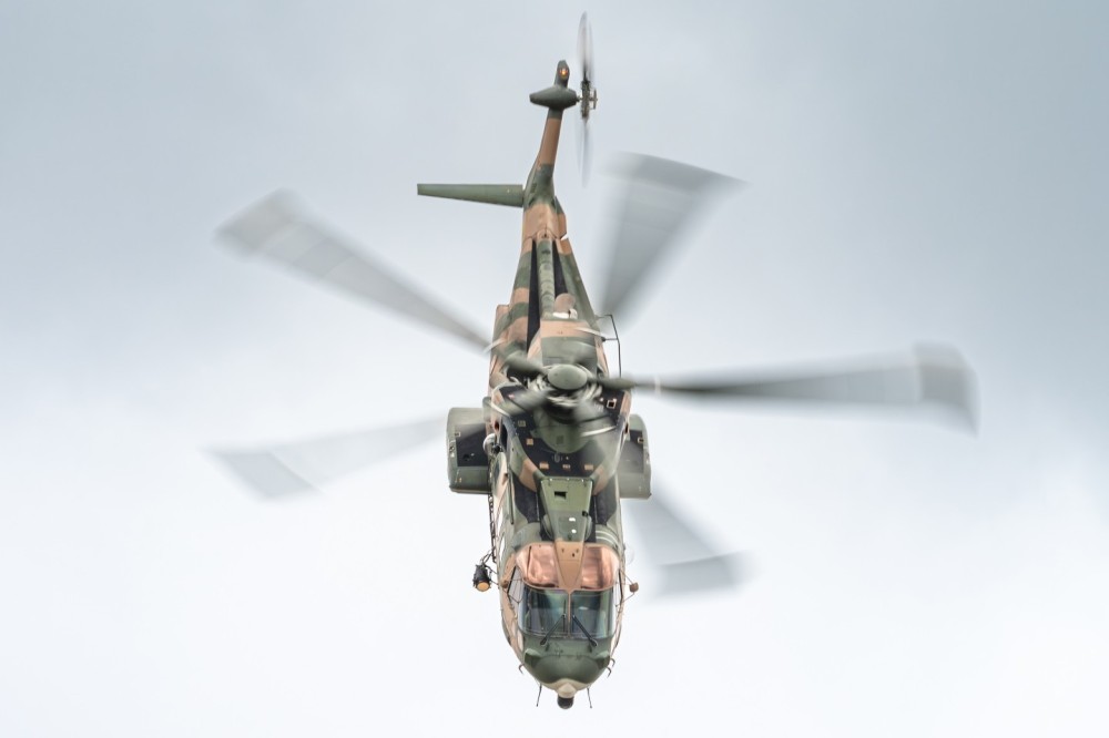 An AgustaWestland AW101 helicopter from the 751 Squadron of the Portugese Air Force is giving a demonstration at the RIAT 2025 airshow.