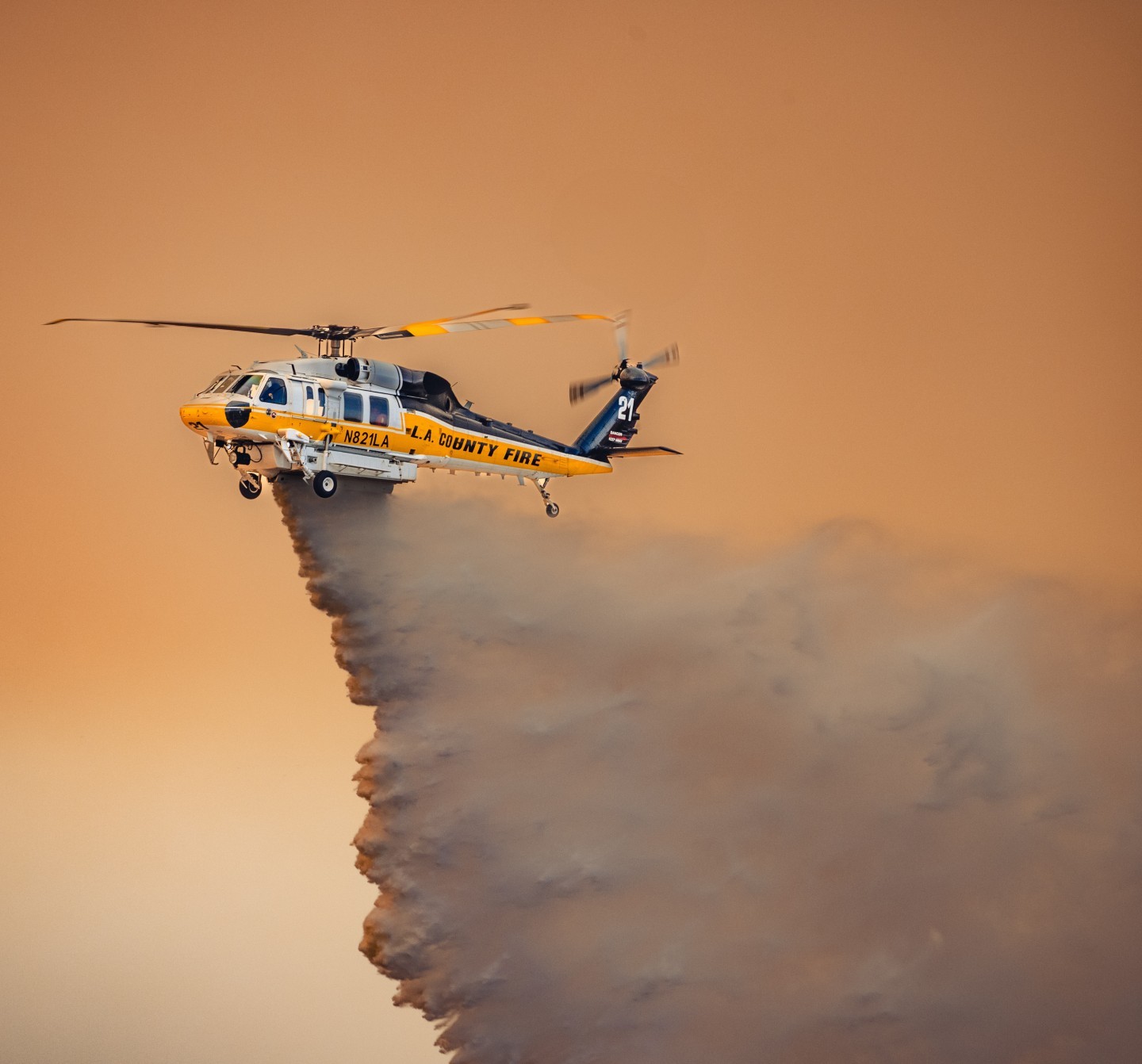 La county Fire Firehawk making easy work of a brush fire in lancaster,  ca