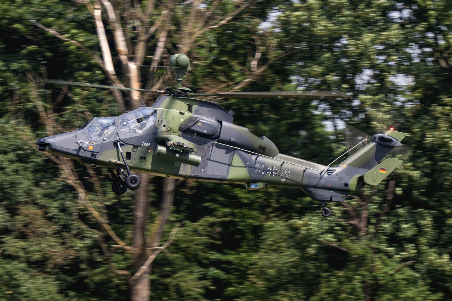 A German Tiger departs at high speed for Heeresflugplatz Bückeburg to perform a demonstration during the Bundeswehr Day. The countdown for the German Tiger has already begun, as Germany has decided to phase out this helicopter in the near future.