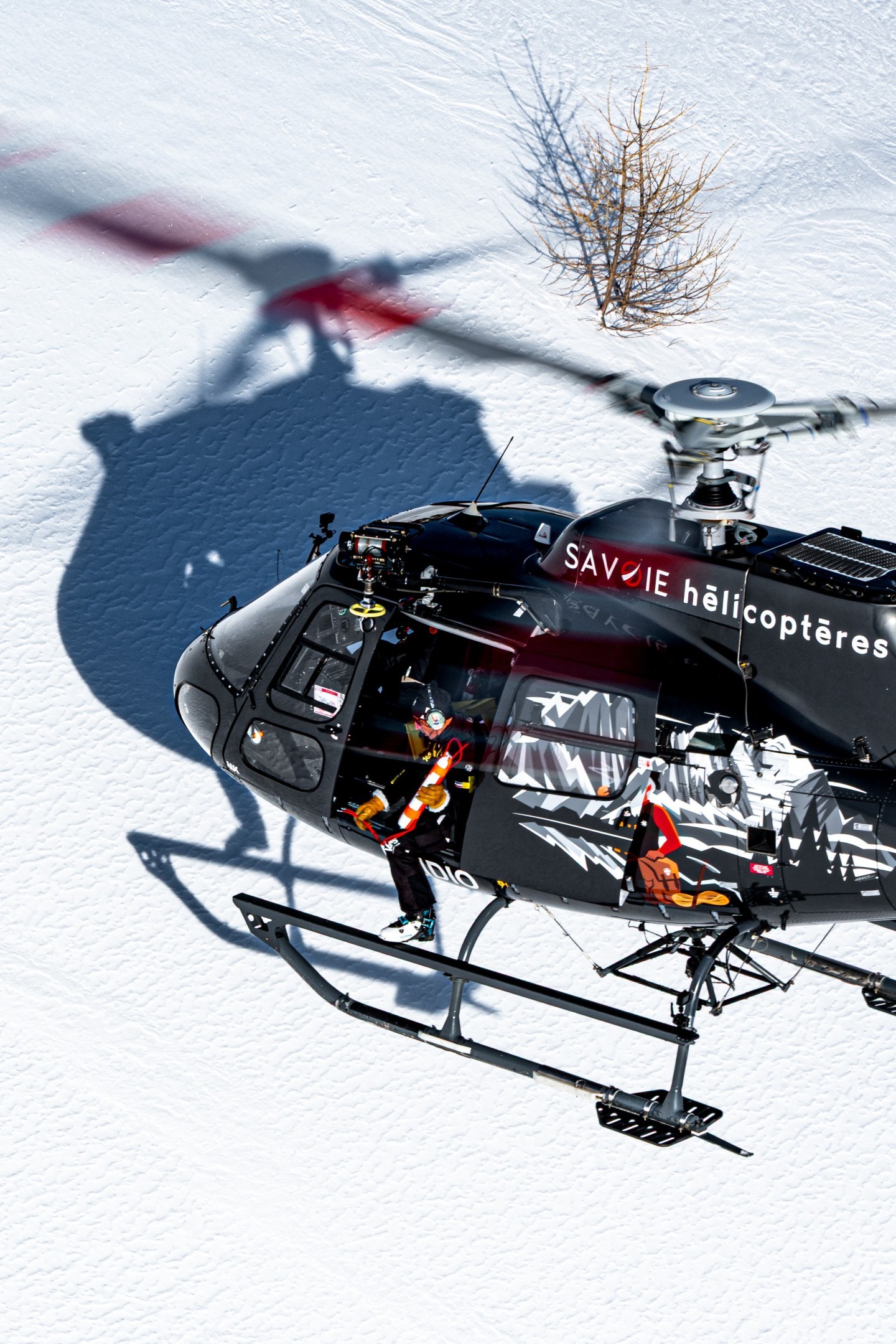I captured this extreme and rare moment of a dynamite launch from an H125 to trigger avalanches in the French Alps. We were shooting air-to-air and I managed to capture the moment when the bomber prepares to launch his dynamite into the snow.