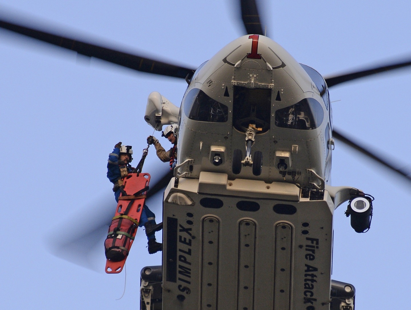 LAFD "Fire 1" conducitng a hoist rescue of an adult male rock-climber who had fallen approximately 30 feet and due to his injuries the determination was made that carrying the victim down would be too difficult and might cause additional discomfort to the victim. The man was transported to a nearby trauma center.