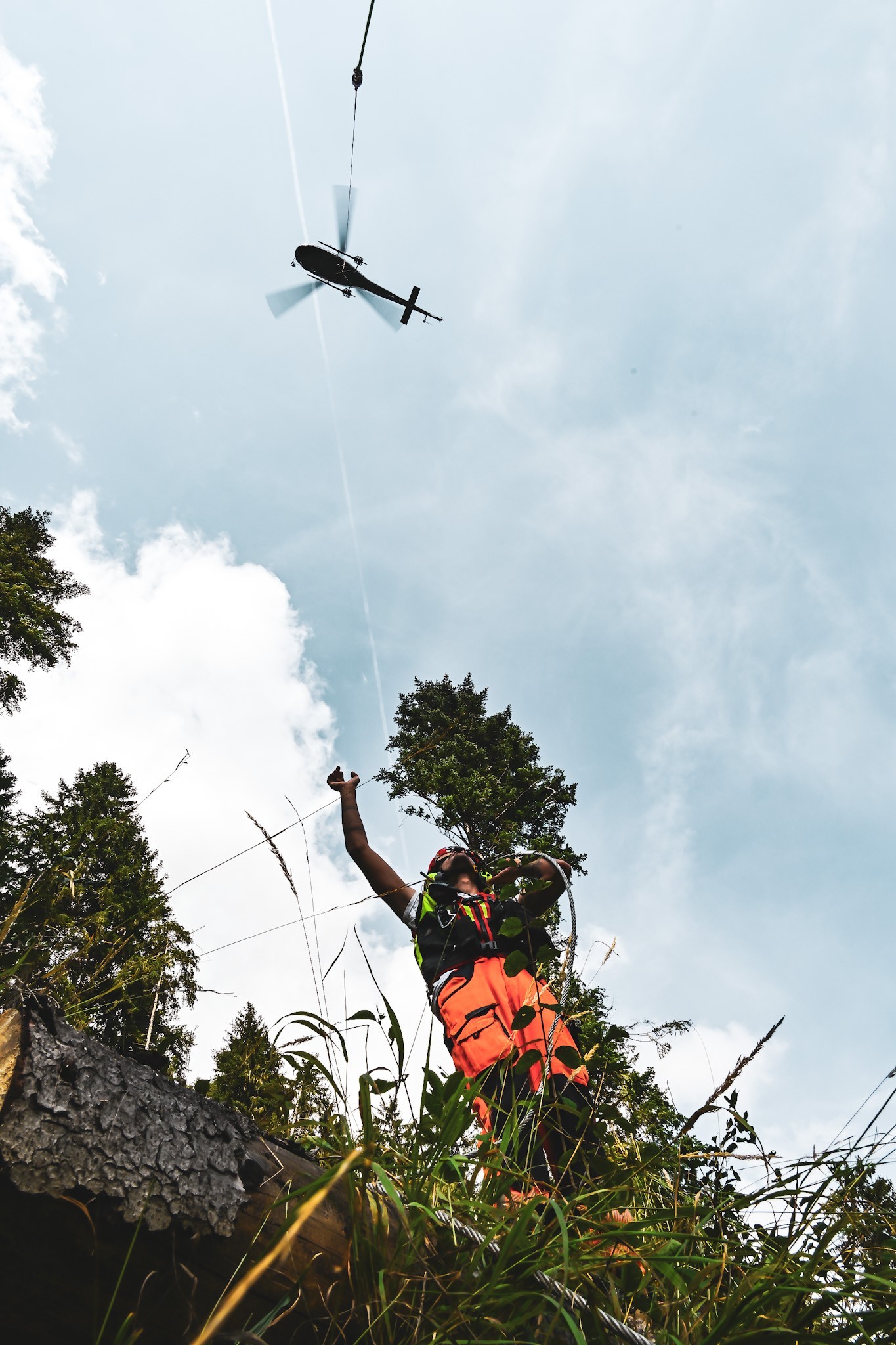 Took this picture with Savoie Helicoptere, 
During a logging mission in Haute-Savoie, being at the heart of the action allowed me to capture these images and truly appreciate their expertise and professionalism.