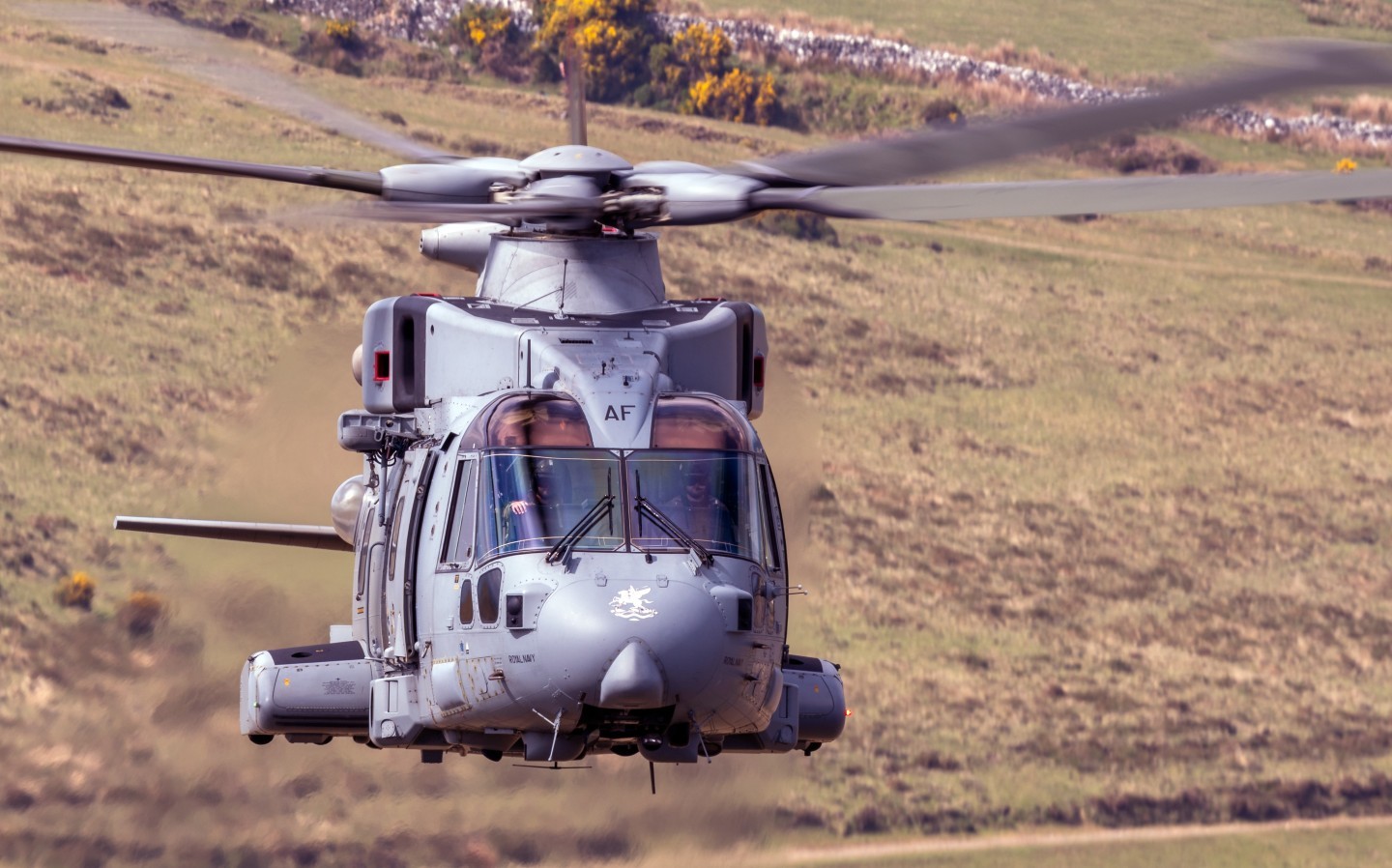 Royal Navy Merlin MK4 Helicopter Commando low level flying on Dartmoor in support of the Ten Tors 2025 event under Operation Wyvern Tor.  The RN rotary assets assist with many logistics of the event including, transport, load delivery, casevac etc.
