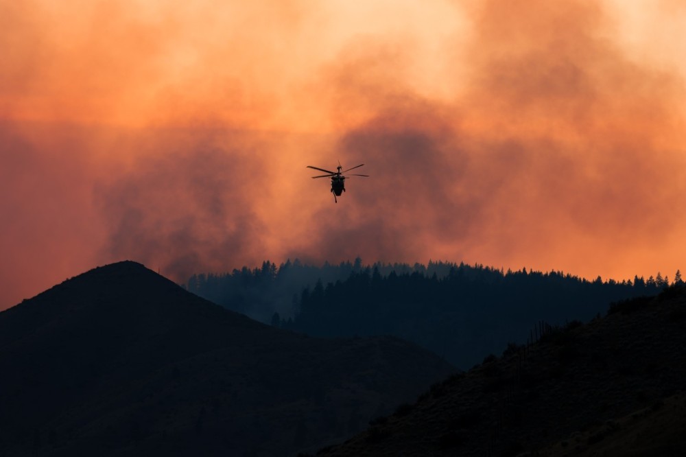Northwest Helicopters N660NW Blackhawk dubbed 'Merica with its final flight of the night up the Entiat River Valley in support of the Lower Sugarloaf Fire after drafting from the Columbia River