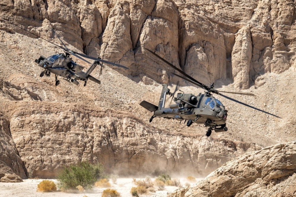 I got an amazing opportunity to photograph Army AH-4 Apache Attack helicopters from the 4th Battalion, 6th Cavalry flying through a desert canyon in Anza-Borrego Desert State Park near the town of Borrego Springs, California. Fortunately, I was able to drive a sandy dirt road to the location and climb a very slippery, but short hill, because the hike in 106° weather would have been quite difficult.