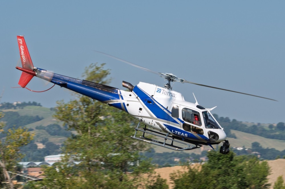 Airbus H125 "I-TEAS" named "Gheppio" owned by "TERNA", "Rete Elettrica Nazionale S.p.A" during take-off from Sassuolo airport (Modena) for inspection of national power lines.