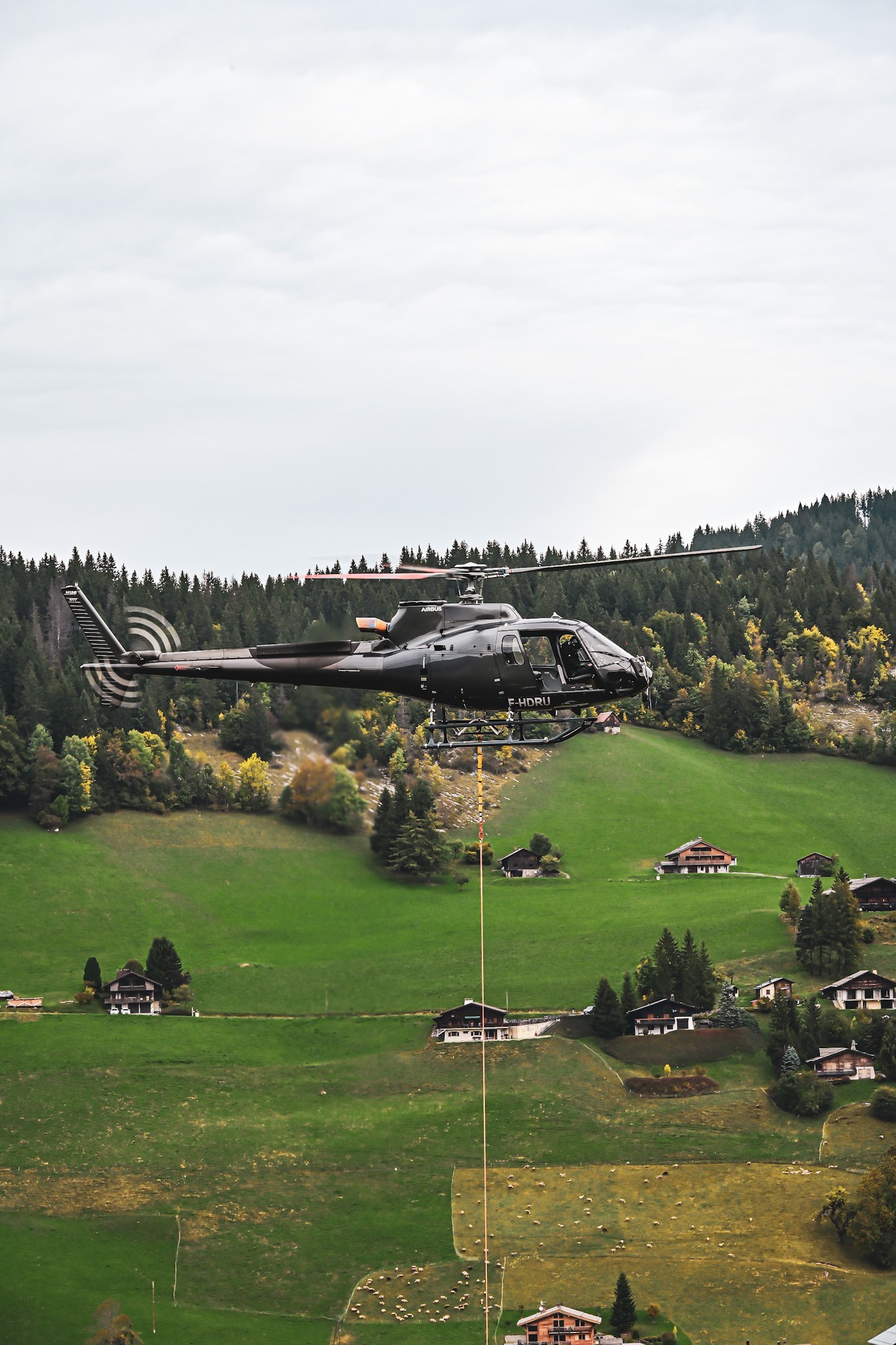 I took this picture with Savoie Hélicoptère team during a concrete operation in La Clusaz France. 
The sky was not really nice but the atmosphere was amazing!