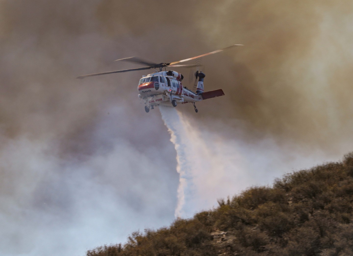 CalFire Copter 609 working the Madera Fire in Riverside County, California. They made several drops on this fire. The fire was held to 19 acres. There were no reports of injuries or damage.