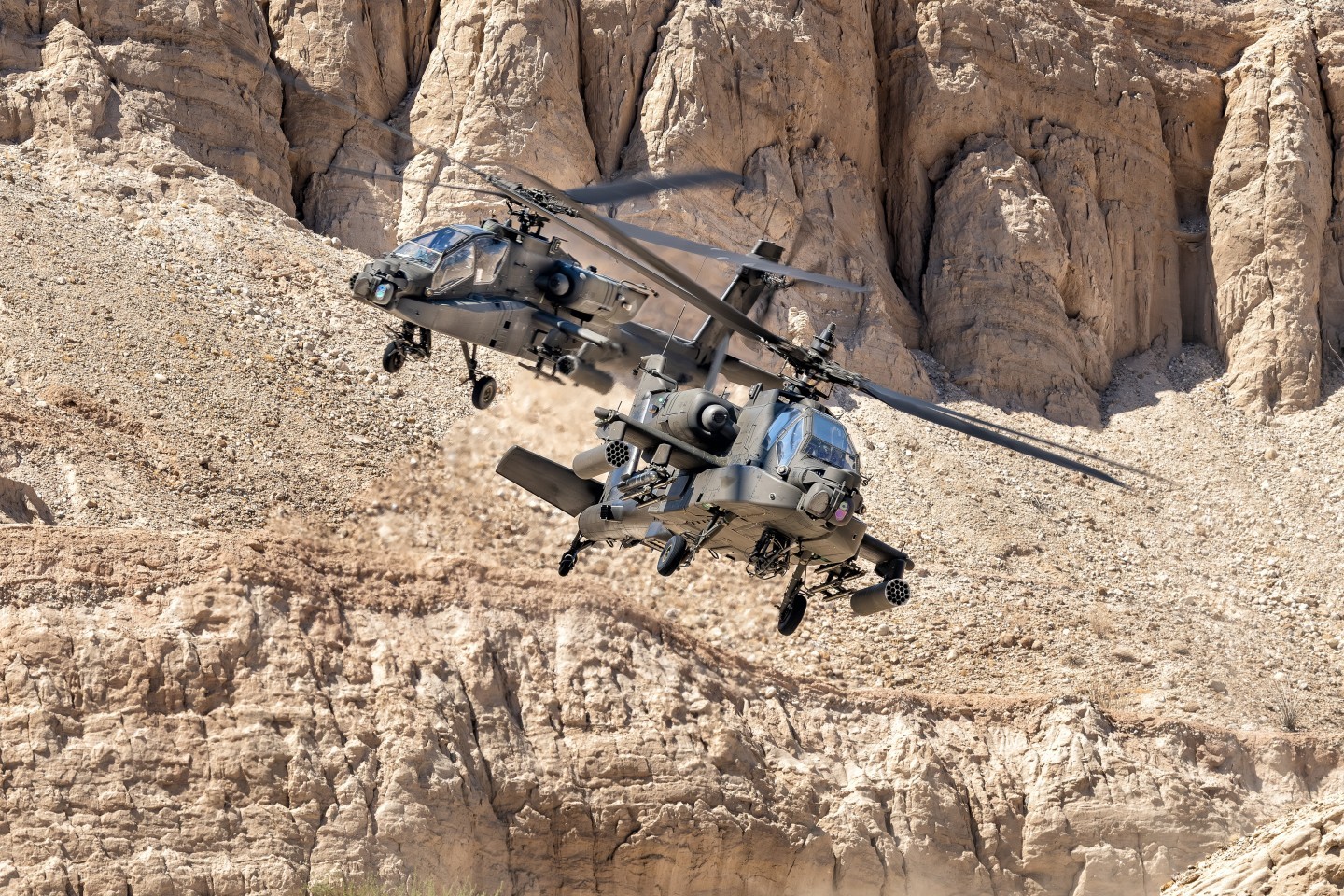 It was amazing watching these highly skilled pilots navigate a small canyon at Anza-Borrego Desert State Park, California. These Army AH-4 Apache Attack helicopters were from the 4th Battalion, 6th Cavalry.  Fortunately, I was able to drive a sandy dirt road to the location and climb a very slippery, but short hill, because the hike in 106° weather would have been quite difficult.