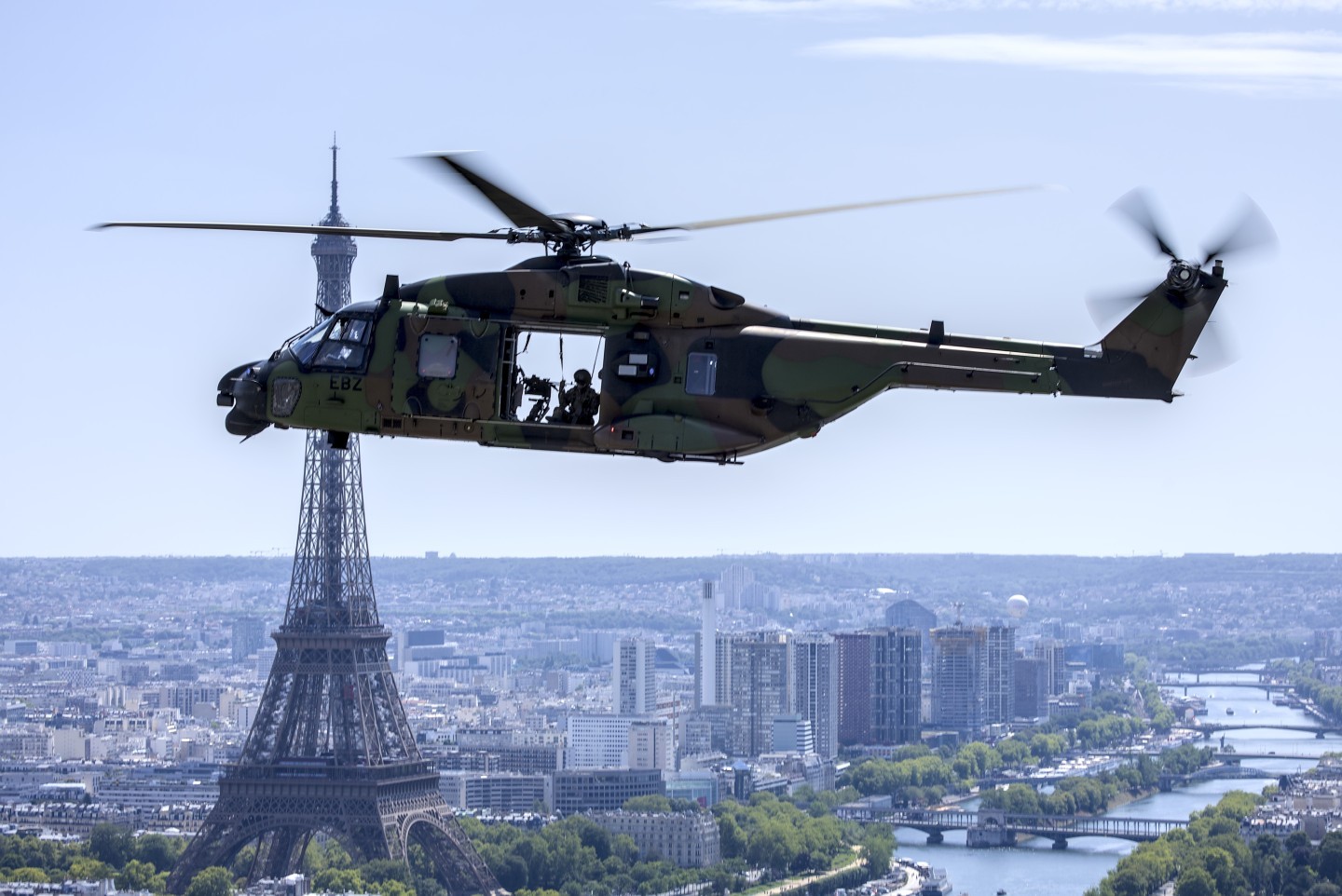 20250709 French Armee de Terre ALAT NH90 helicopter flying overhead Paris during the reharsals for the annual Bastille Parade. The NH90 flew last in a larger helicopter formation