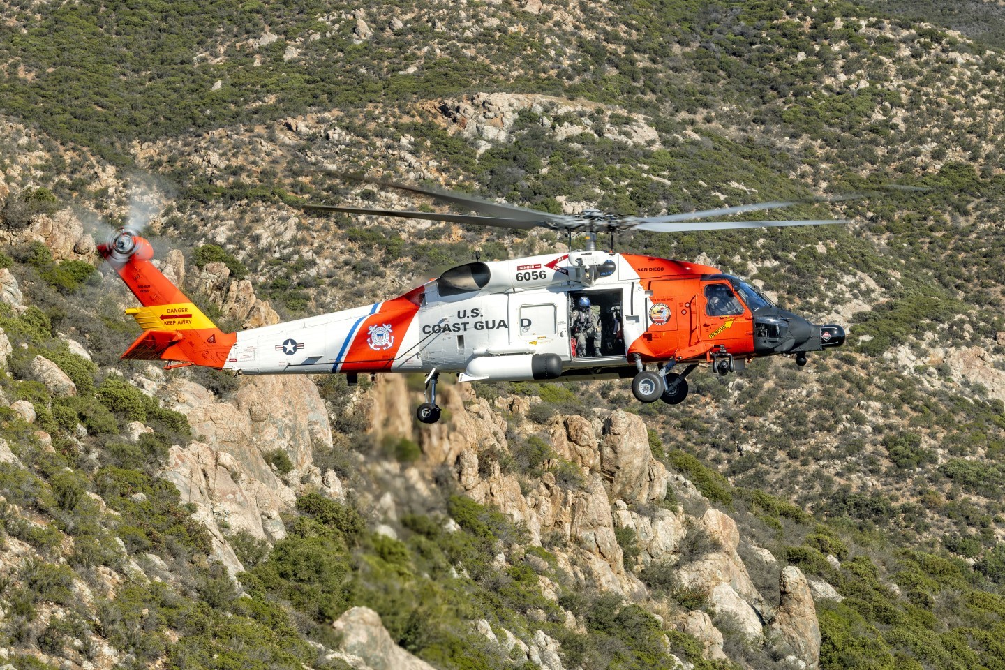 I did a special shoot of the United State Coast Guard Sikorsky MH-60T Jayhawk helicopter on the Otay Mountains in San Diego County, California. I got permission to drive on a BLM land dirt road which got me near the top of mountain. I then hiked up a brush filled hill to get to the right location. The road driving up was very bumpy and close to extremely steep drop offs.