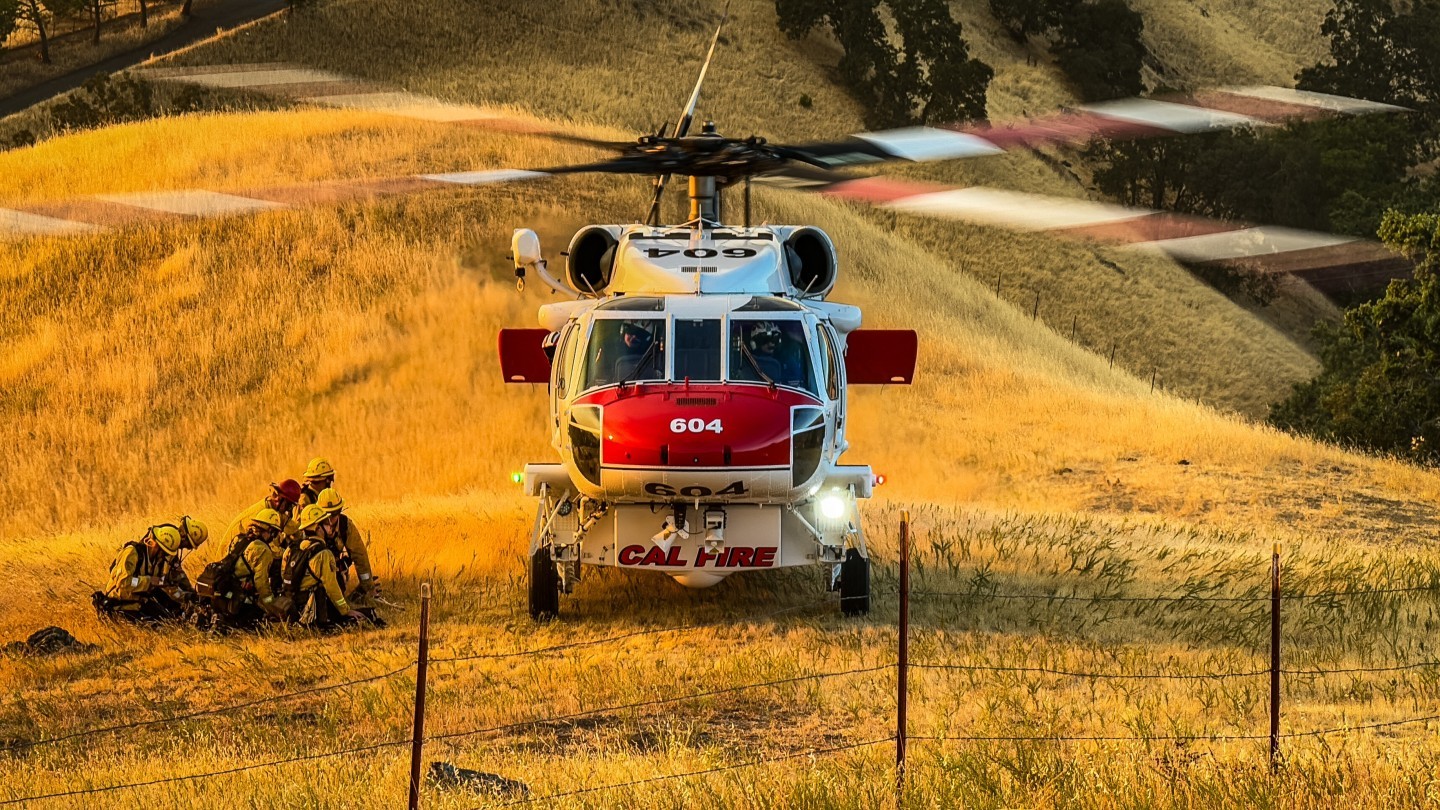 CalFire Copter 604 picking up crew members on the Palo Incident Sept 01 2021 in Alameda County California.