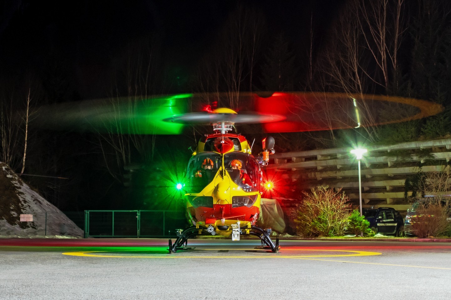 This is the Airbus H145D3 "Dragon 74" of the Sécurité Civile photographed at the Jean-Jacques Mollaret rescue base in Chamonix, France. Here, the pilots are performing their final checks before their night training mission.
