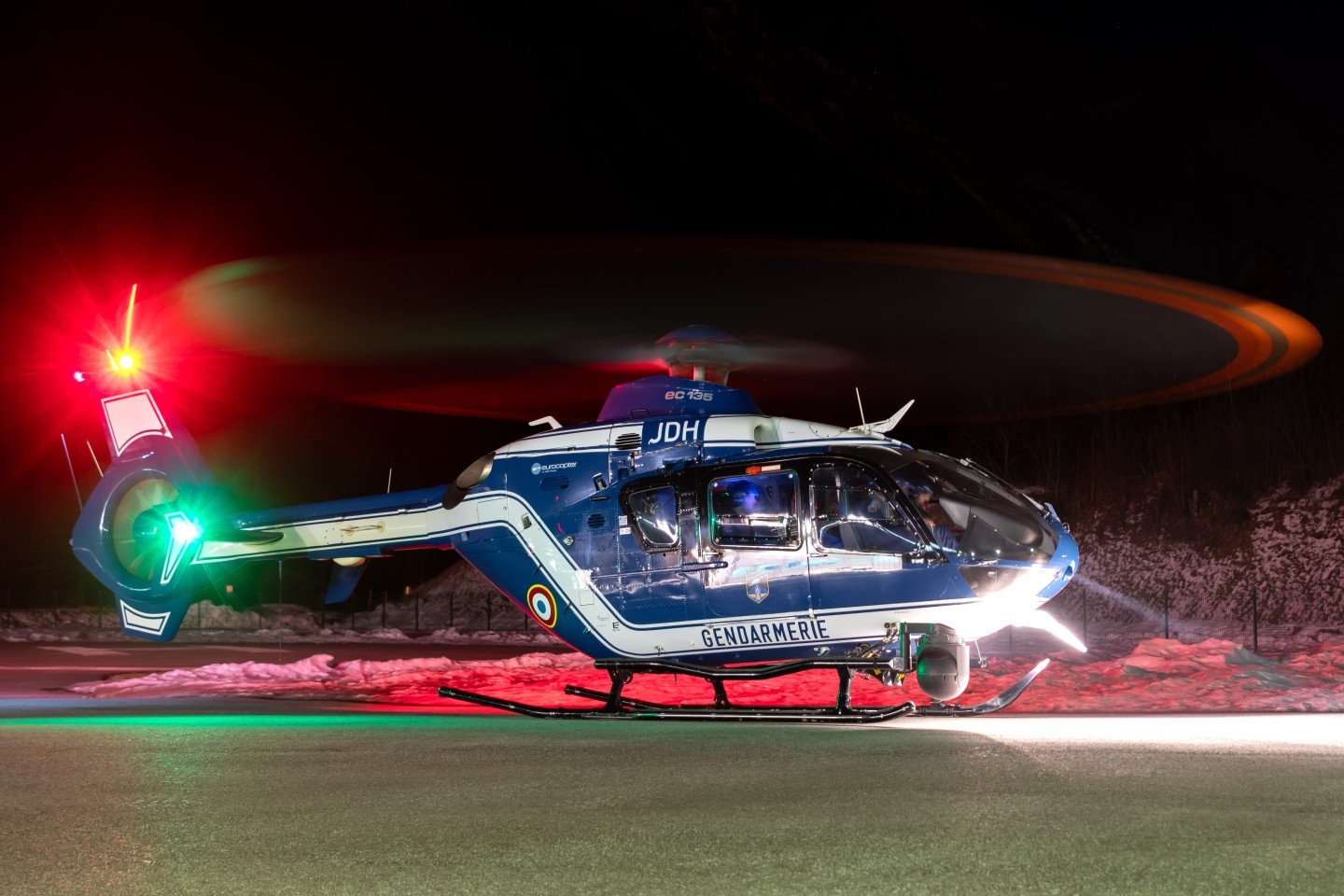 This is the Airbus EC135 of the Gendarmerie Air Forces at the Jean-Jacques Mollaret Rescue Base in Chamonix, France, just before it departs on its night training mission in the French Alps.