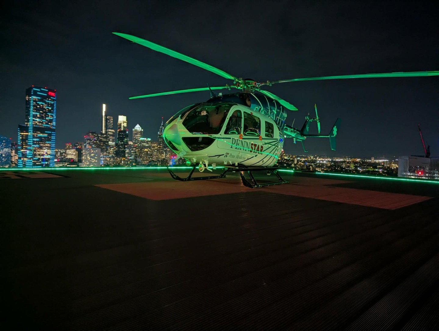 PennStar1 (operated by Metro Aviation), University Penn Hospital network on rooftop pad of Univ Penn Hospital, Philadelphia, Pa.  Center city Philadelphia in background.