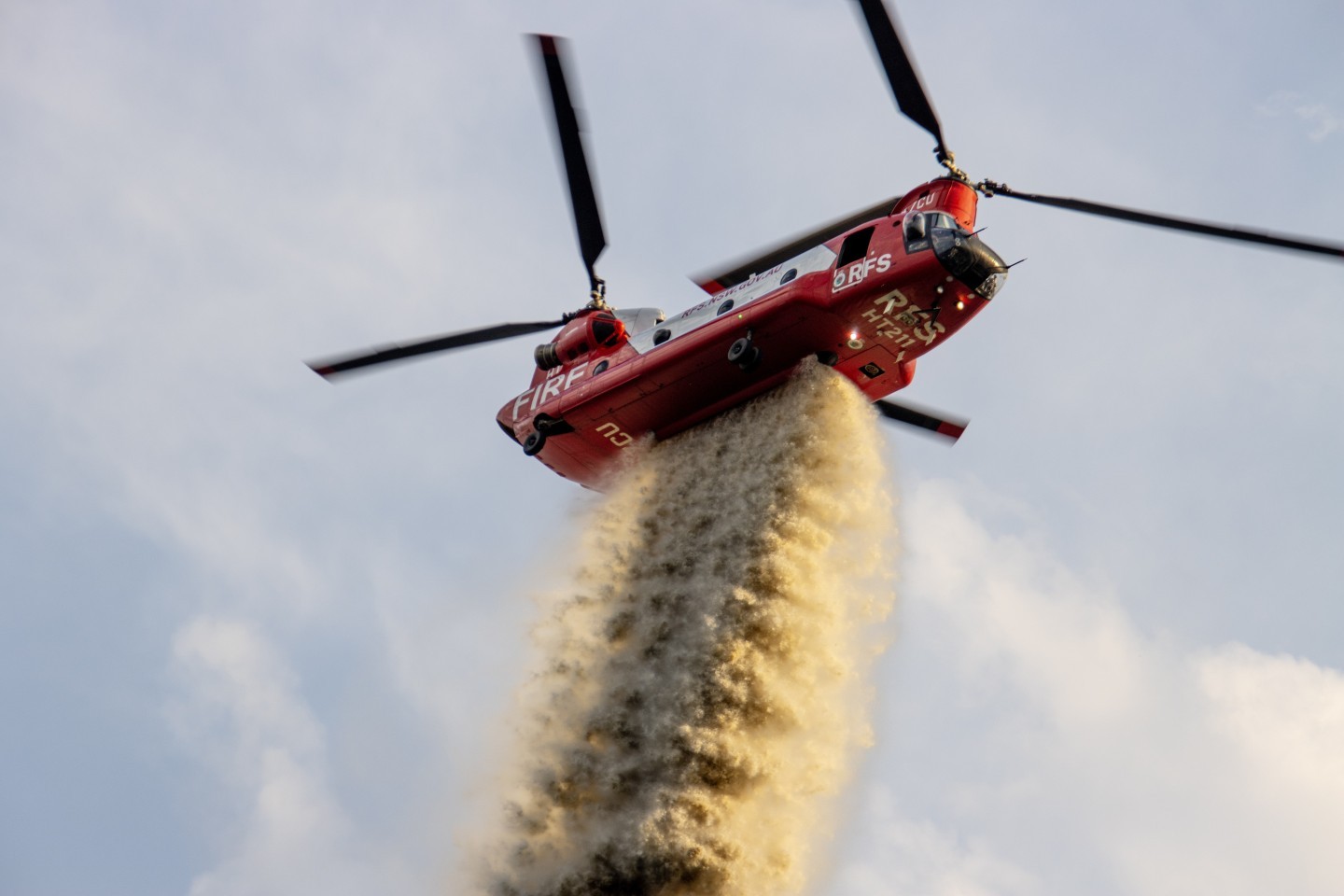 HT211 dropping water at the Koolewong Fire