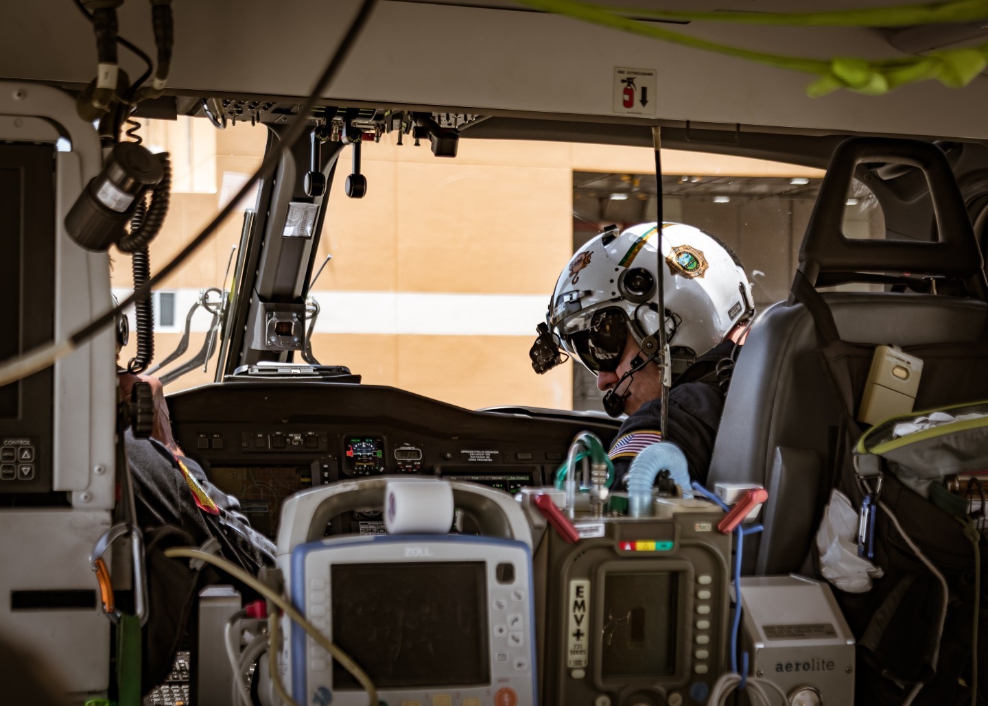 A Miami Dade Fire Rescue pilot preps Air Rescue 1 for departure from Miami Excecutive Airport, one of the 2 Miami Dade Fire Rescue Air Rescue stations serving South Florida