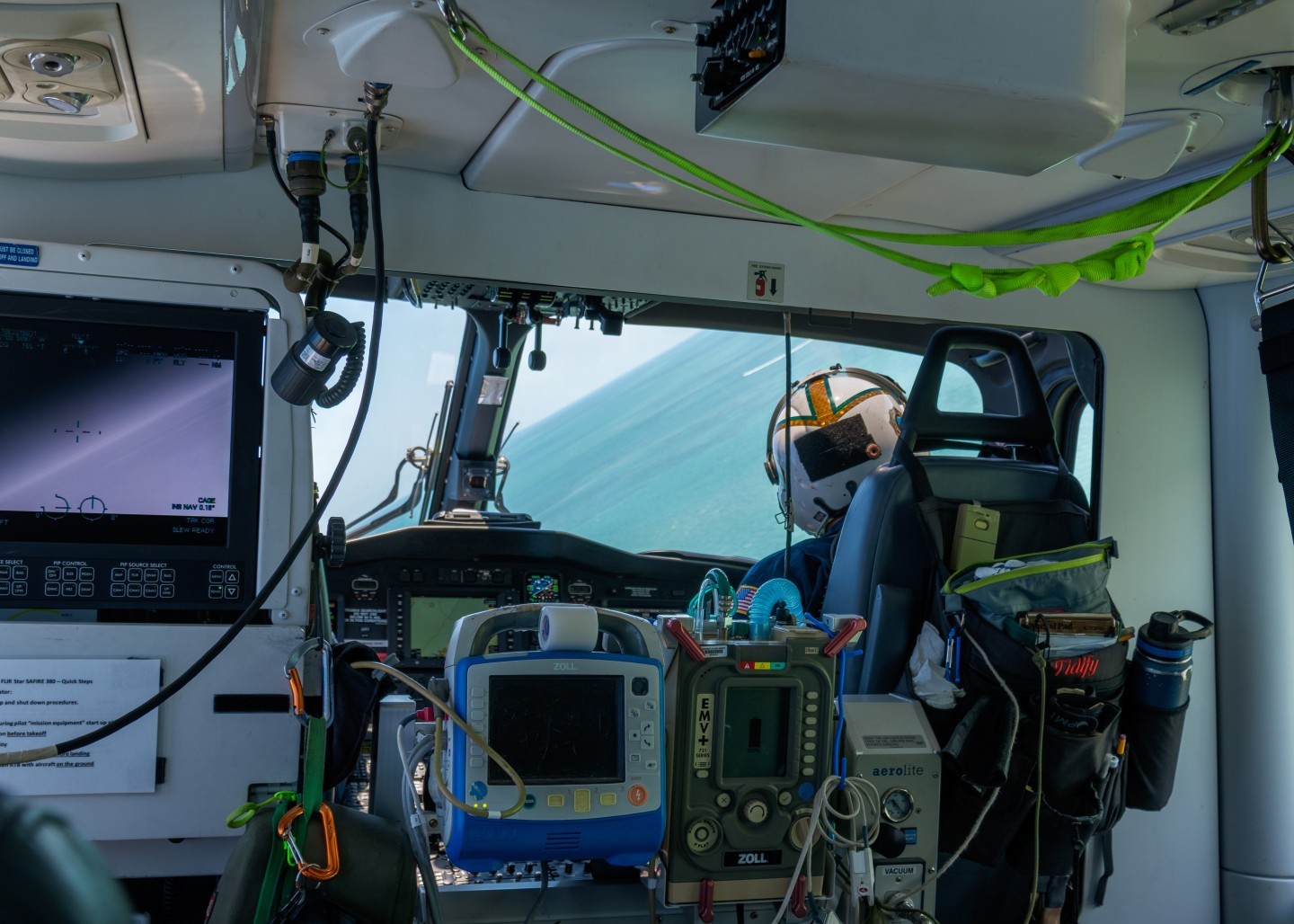 Miami Dade Fire Rescue Air Rescue 1 banking to right to reveal the beautiful blue waters of Miami Beach during a familiarization flight.