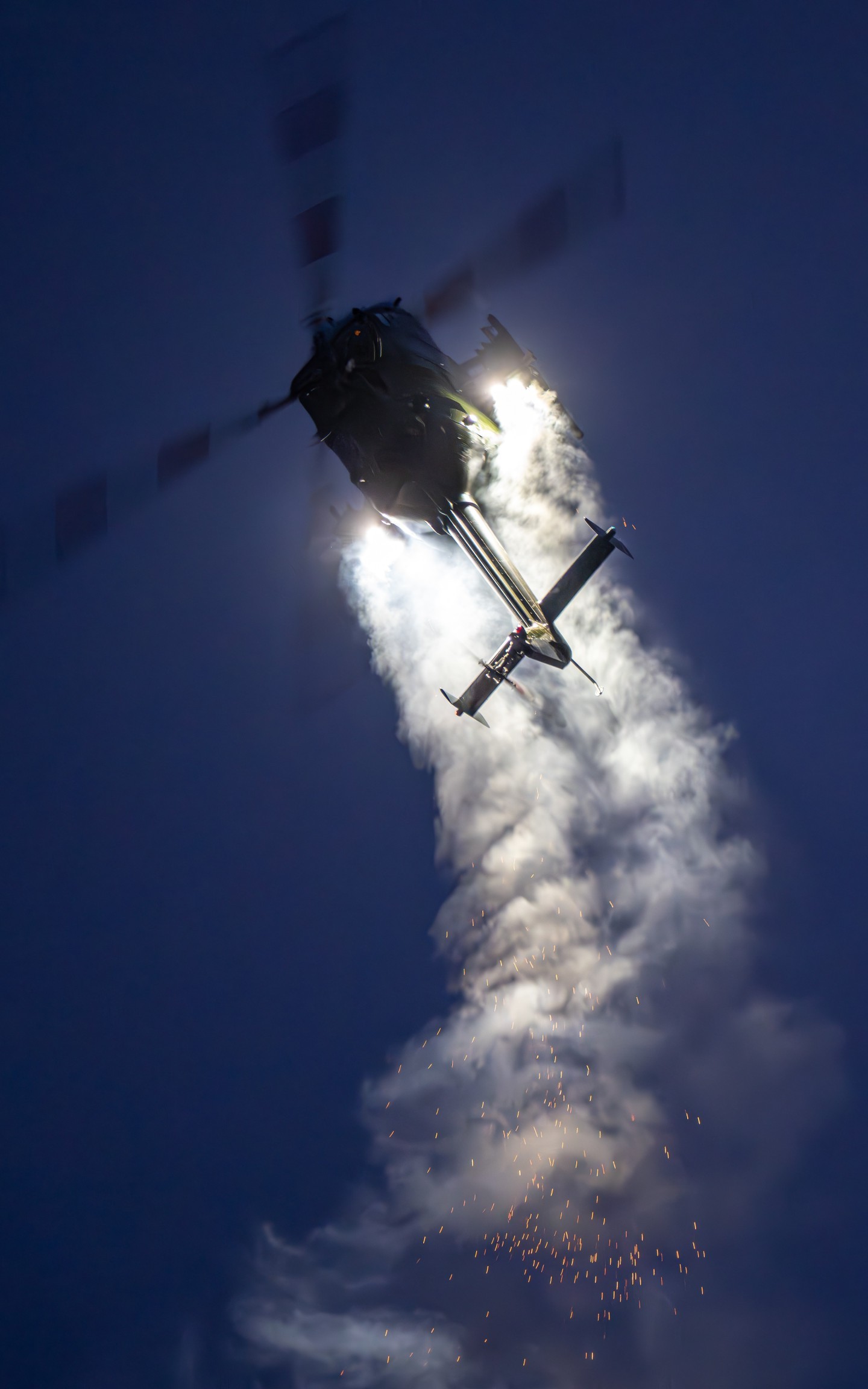 The photo was taken at the Sanicole Sunset Airshow 2025 in Belgium, capturing the Polish Bölkow Bo-105 helicopter flown by veteran pilot Maciej Dominiak. Once a German Army attack helicopter, now reborn as a spectacular airshow performer, the Bo-105 shows breathtaking agility and precision. During the display, it lights up the evening sky with fireworks, blending technical mastery, pilot skill, and pure visual drama.