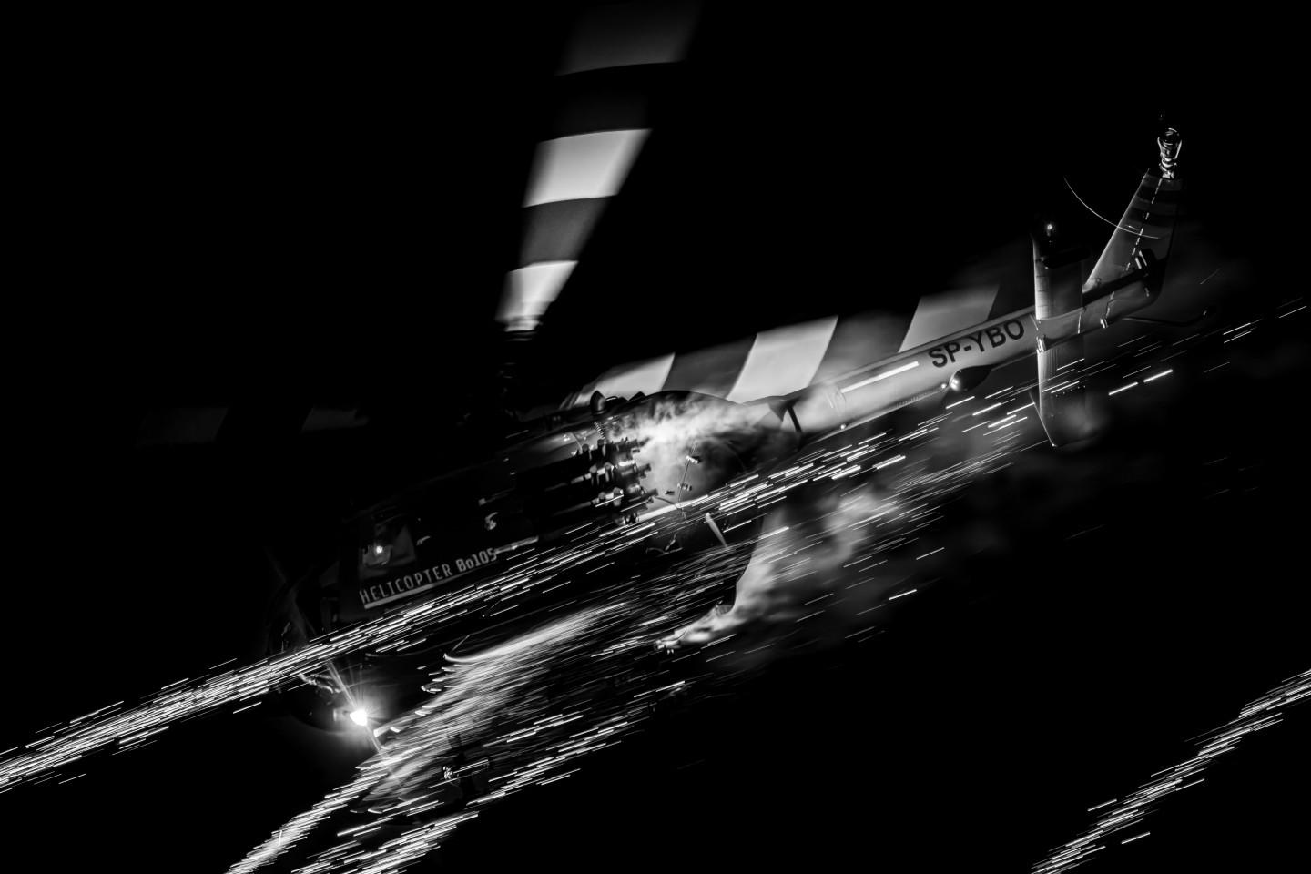 The photo was taken at the Sanicole Sunset Airshow 2025 in Belgium, capturing the Polish Bölkow Bo-105 helicopter flown by veteran pilot Maciej Dominiak. Once a German Army attack helicopter, now reborn as a spectacular airshow performer, the Bo-105 shows breathtaking agility and precision. During the display, it lights up the evening sky with fireworks, blending technical mastery, pilot skill, and pure visual drama.