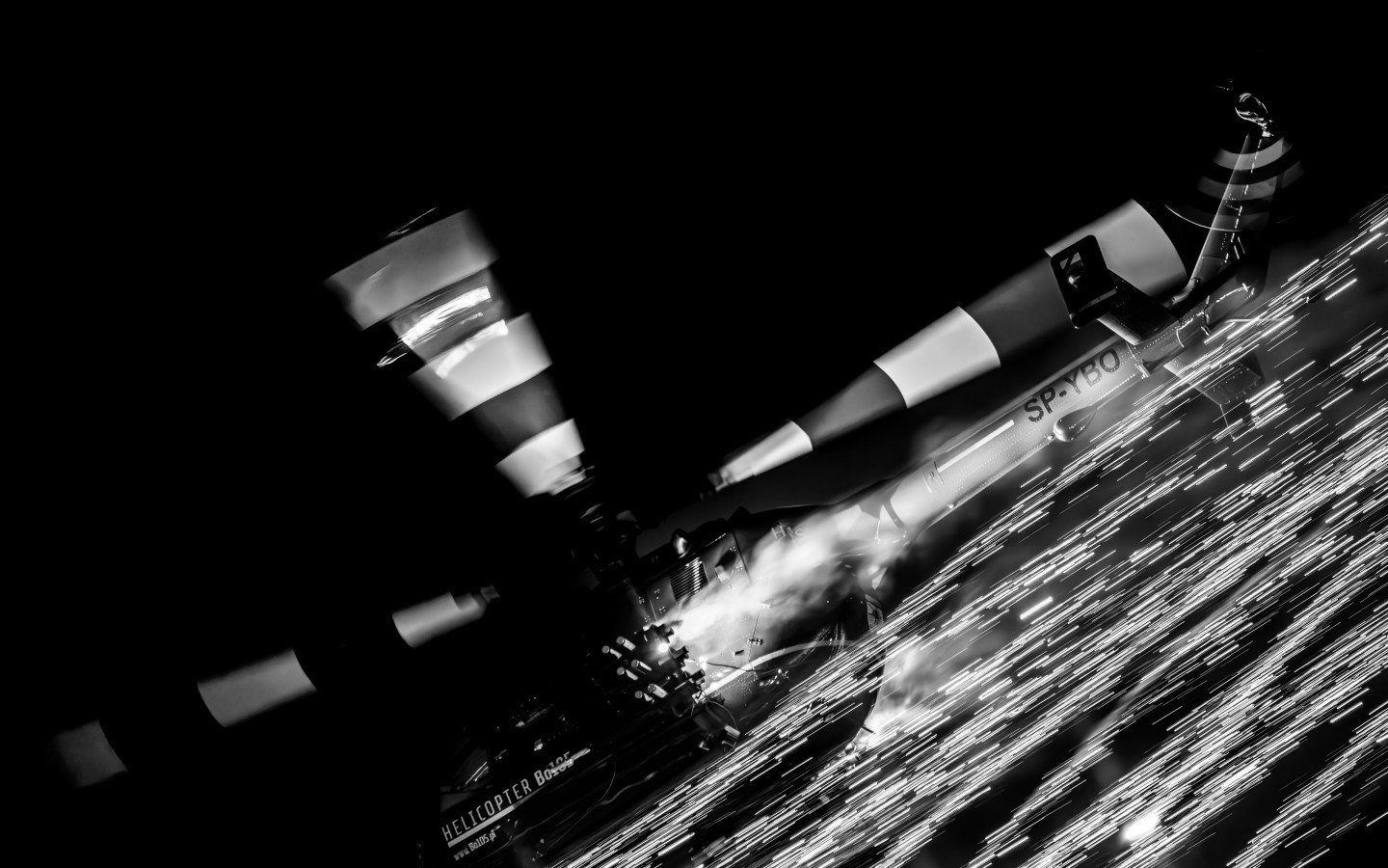 The photo was taken at the Sanicole Sunset Airshow 2025 in Belgium, capturing the Polish Bölkow Bo-105 helicopter flown by veteran pilot Maciej Dominiak. Once a German Army attack helicopter, now reborn as a spectacular airshow performer, the Bo-105 shows breathtaking agility and precision. During the display, it lights up the evening sky with fireworks, blending technical mastery, pilot skill, and pure visual drama.