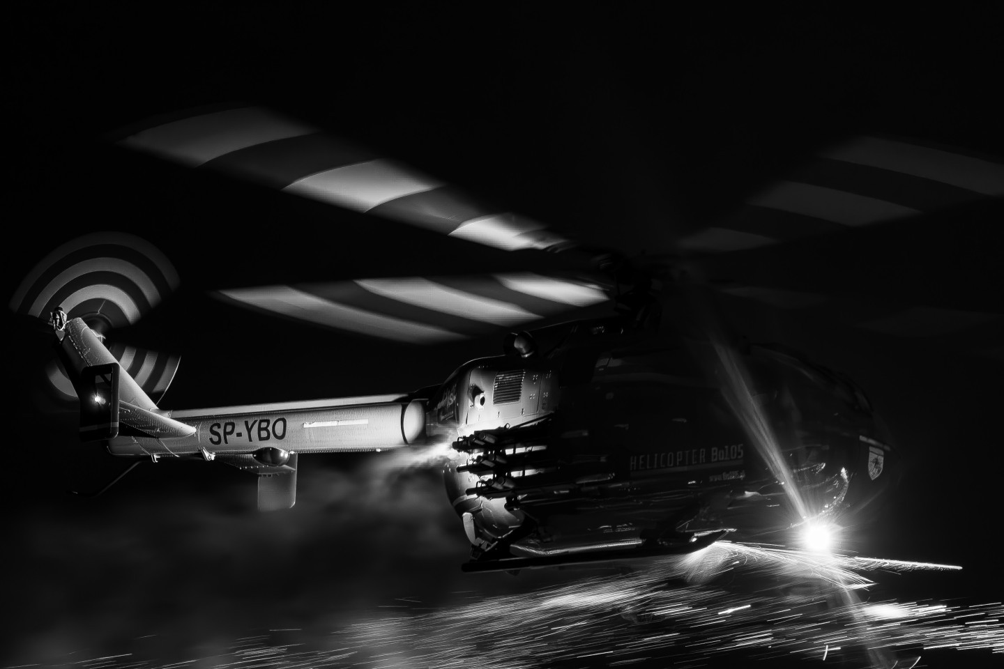 The photo was taken at the Sanicole Sunset Airshow 2025 in Belgium, capturing the Polish Bölkow Bo-105 helicopter flown by veteran pilot Maciej Dominiak. Once a German Army attack helicopter, now reborn as a spectacular airshow performer, the Bo-105 shows breathtaking agility and precision. During the display, it lights up the evening sky with fireworks, blending technical mastery, pilot skill, and pure visual drama.