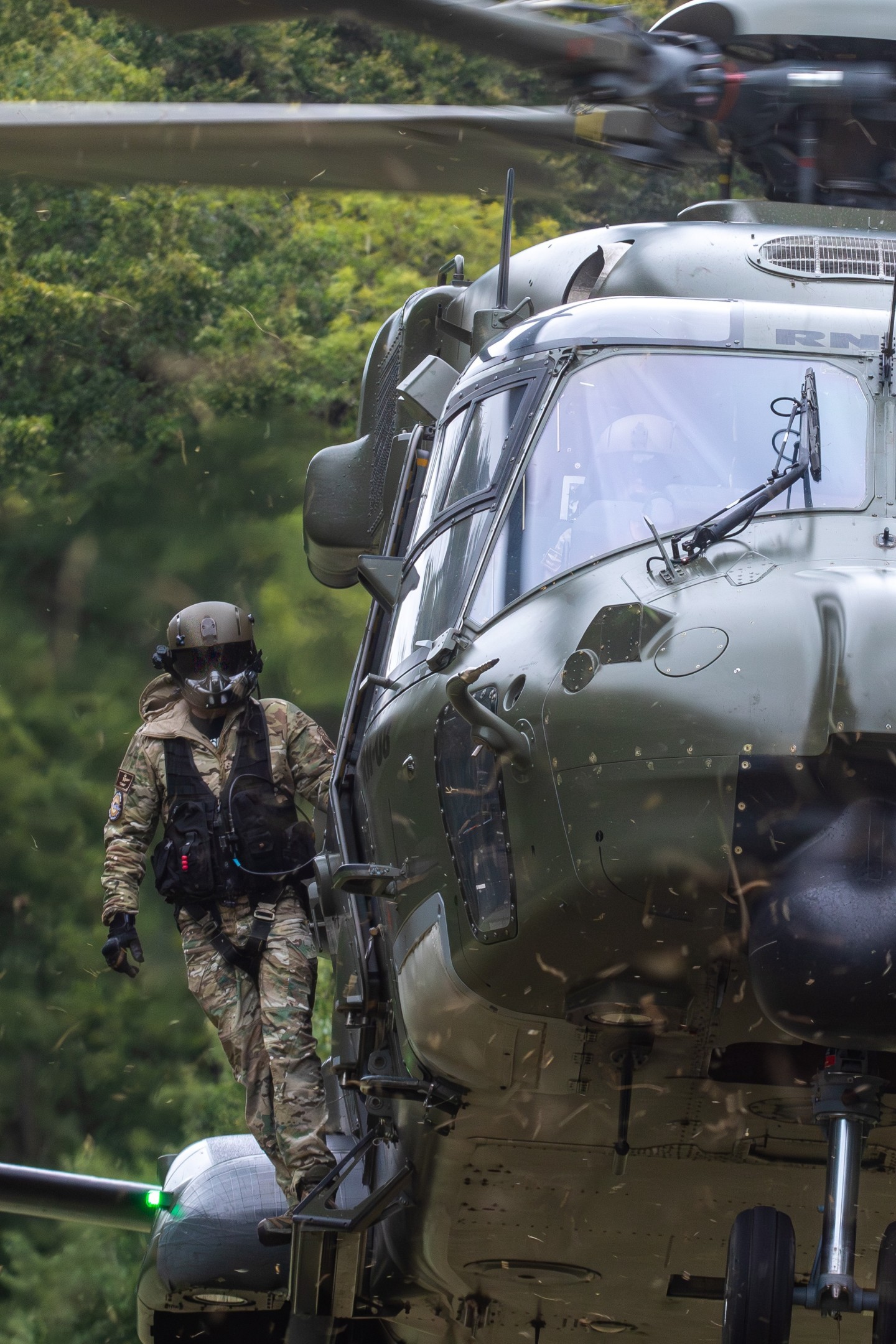 On of the cabin operators on the Belgian air force NH90 TTH's looking out during a confined landing to make sure they get down safely. These cabin operators are proven to be a crucial part ofthe crew.