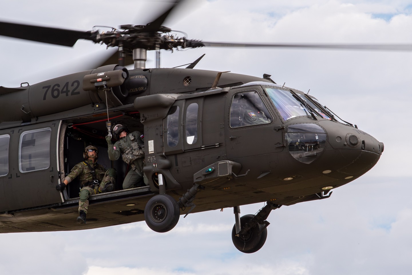 the cabin operator and rescuer of this Slovenian air force blackhawk getting ready to commence with the hoisting excersice of the Gallileo Sarmeet 2025