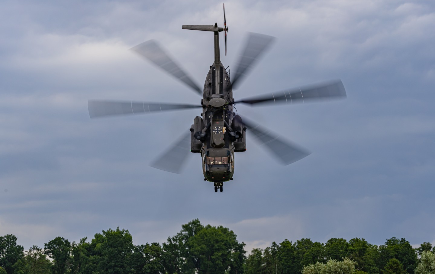 84+74, CH53 GA  during a trainingflight in southern Germany. The Helicopter is based at Laupheim Airbase. Here u can see it during a Trainingflight, performing an amazing Takeoff