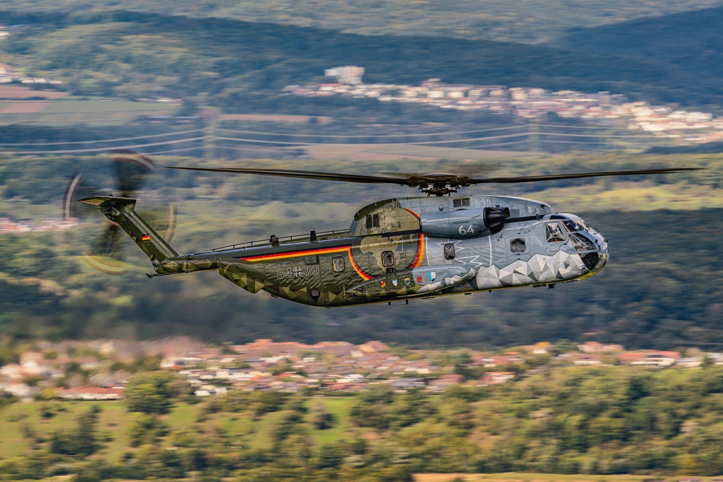 84+70, CH53 , during a ferry flight in southern Germany. The Helicopter was at Hahnweide, a nice show near Stuttgart, and went back to Laupheim Airbase. It has the special Paint for 53 Years of using the CH53