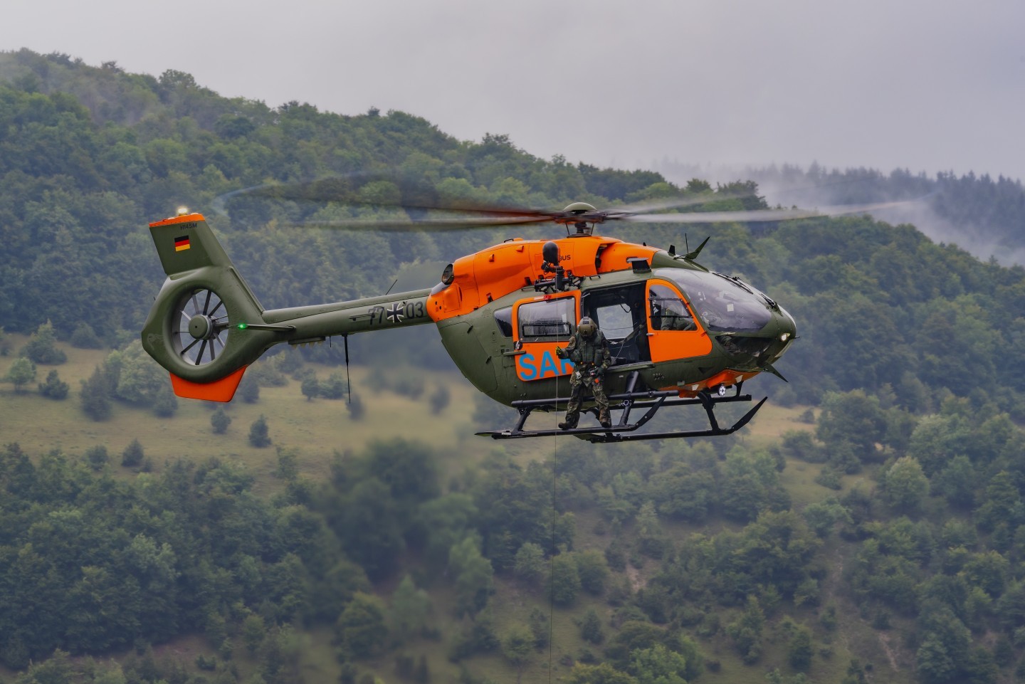 77+03, H145 LUH SAR of the Bundeswehr. The helicopter is based at Niederstetten Airfield. Here you can see it during a Training with the Rescuedogs of "Malteser Hilfsdienst" in bad weather conditions