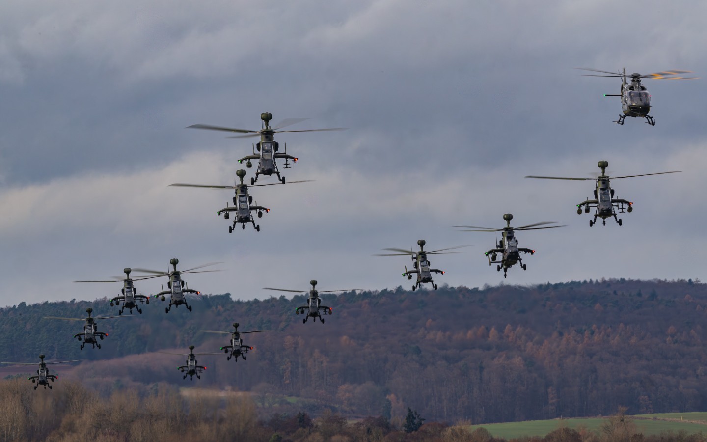 End of the Year Formation of the German "Kampfhubschrauberregiment 36" in Fritzlar. Here u can see 12 EC665 Tiger and one H135 Helicopter. The formation is taking off for a 2 hours flight over Hessen
