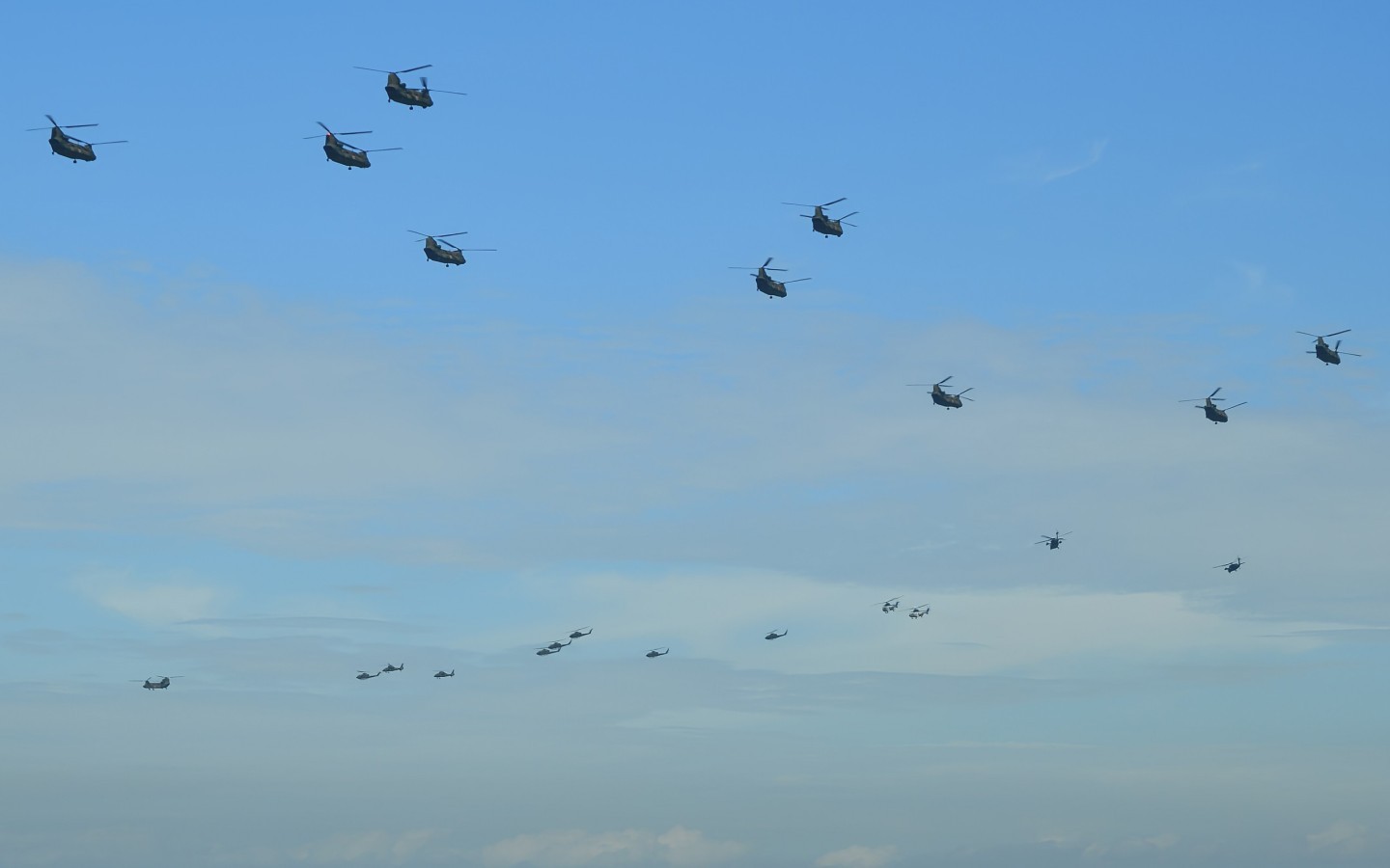 Mass formation flight of JGSDF Helos were departed in Kisarazu Airshow.
This spectacular formation is a hallmark of the airshow.