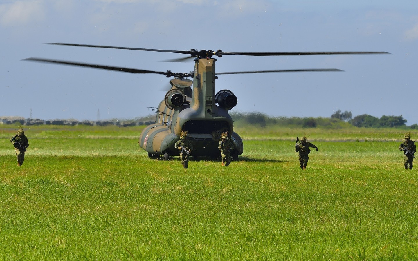 JGSDF Troops disembarked from CH-47JA Chinook were running to holding position during air assault demonstration in Kisarazu Airshow.