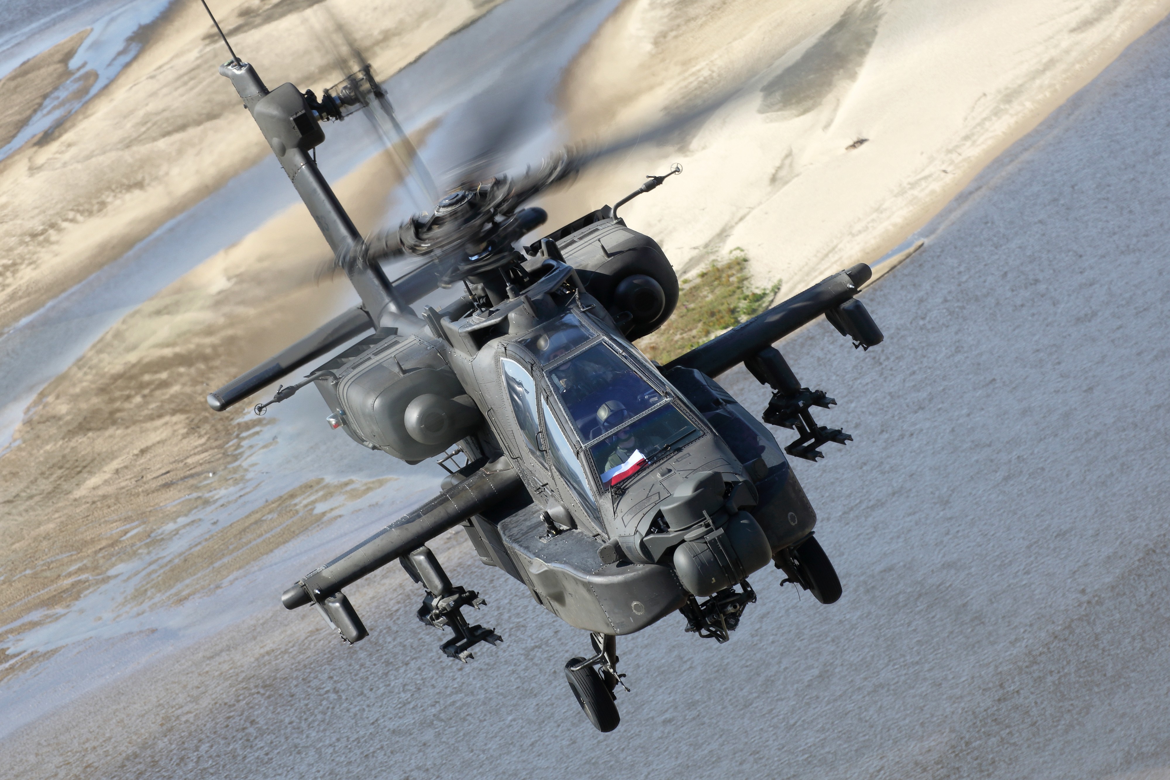 Leased from US Army Apache with Polish markings over Vistula river