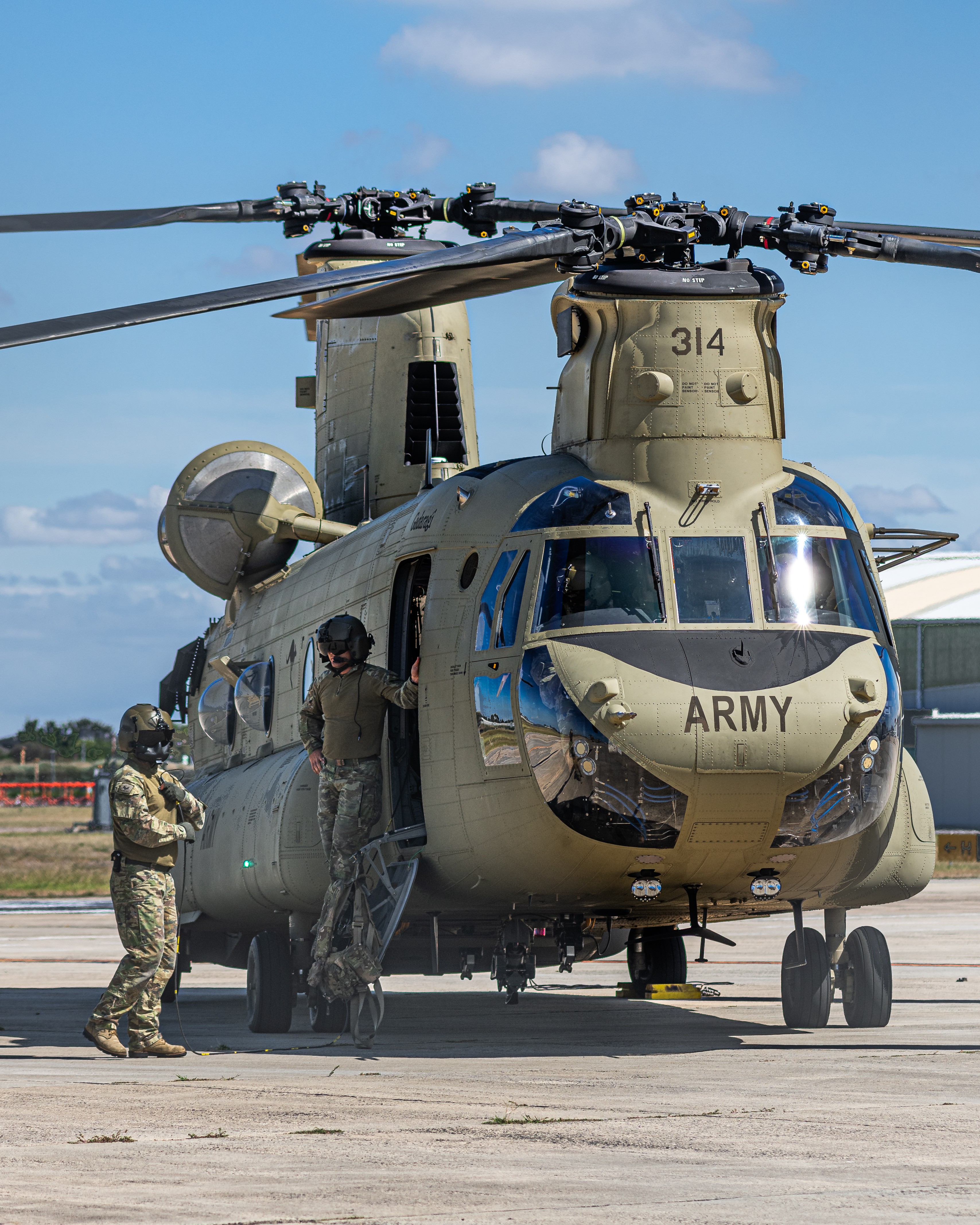 Australian Army Aviation Loadmasters on the ground for a flight of two Chinooks "Chainsaw" arriving in Melbourne for Avalon Australian International Airshow 2025.